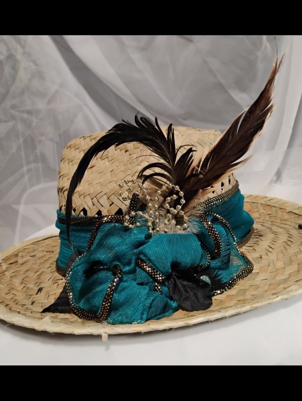 Handmade hat featuring feathers from our very own rooster, Mr. Kentucky! 16in